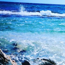 Close-up of waves splashing in sea