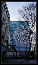 Low angle view of modern building against sky