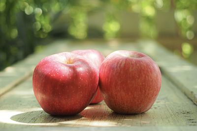 Close-up of apples on table