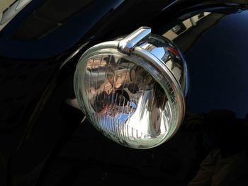 Close-up of vintage car headlight