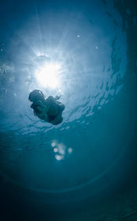 Man swimming in pool