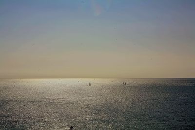 Scenic view of sea at sunset