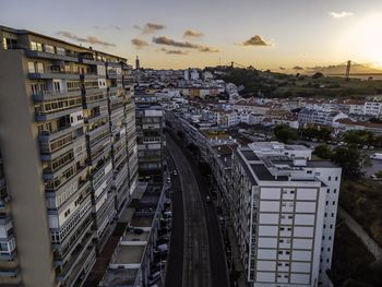 High angle view of street amidst buildings in city