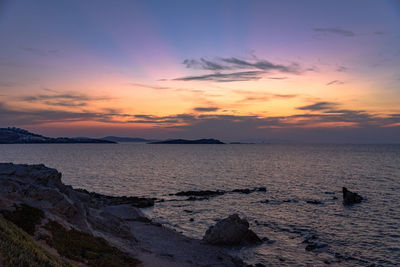 Scenic view of sea against sky during sunset