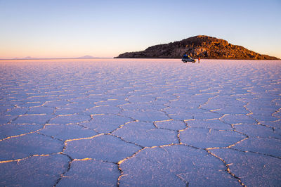 Scenic view of land against clear sky