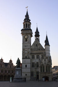 Buildings against clear sky