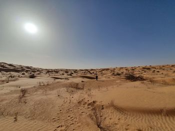 Scenic view of desert against clear sky