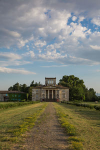 House on field against sky