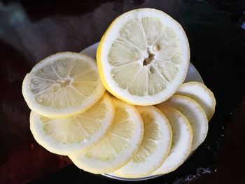 High angle view of lemon slice on table