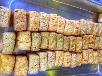 High angle view of bread on barbecue grill