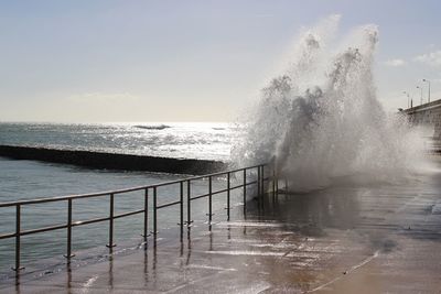 View of waves breaking on shore