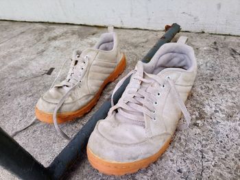 High angle view of shoes on wall