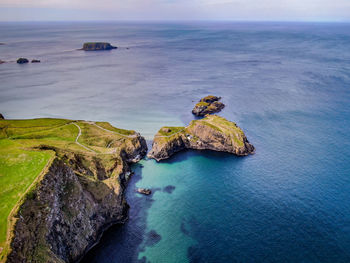 High angle view of rocks in sea