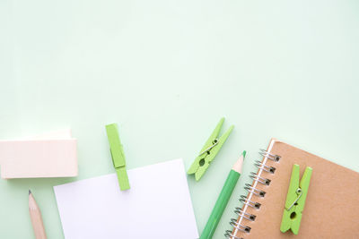 High angle view of paper against white background