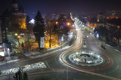 High angle view of light trails on street in city at night