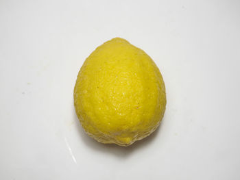 High angle view of lemon on white background