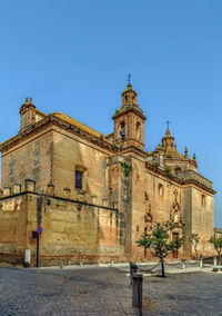 Exterior of historic building against clear blue sky