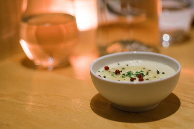 Close-up of healthy soup served on table