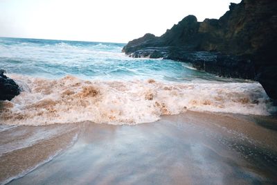 Scenic view of sea against clear sky