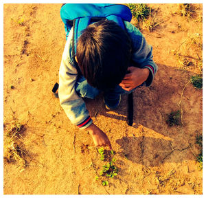 High angle view of boy on field