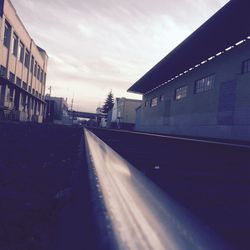 View of bridge against cloudy sky