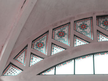 Low angle view of glass window in building