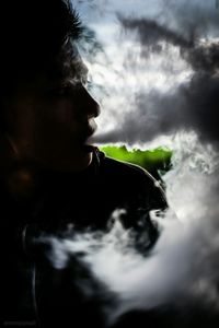 Portrait of woman against clear sky