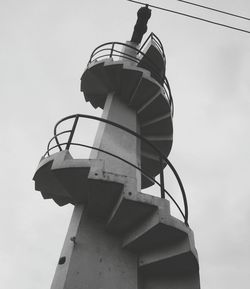 Low angle view of lighthouse against clear sky