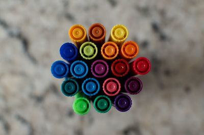 Close-up of multi colored pencils on table