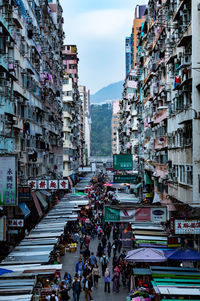 High angle view of market amidst buildings against sky