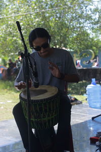 Low angle view of man standing in park