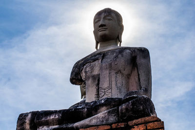 Low angle view of buddha statue