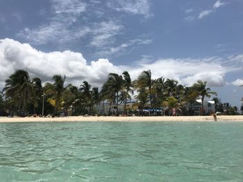 Scenic view of swimming pool by sea against sky