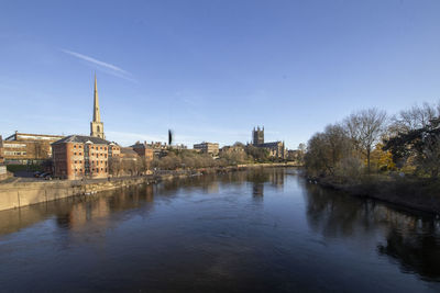 A calm autumn morning looking across the river severn in worcester, worcestershire, uk