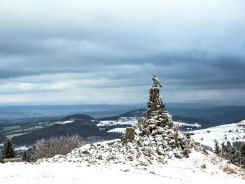 Scenic view of snow covered landscape against sky