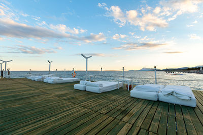 Sun loungers with awnings by the sea