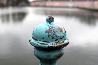 Close-up of fire hydrant on lake