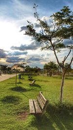 Scenic view of green landscape against sky