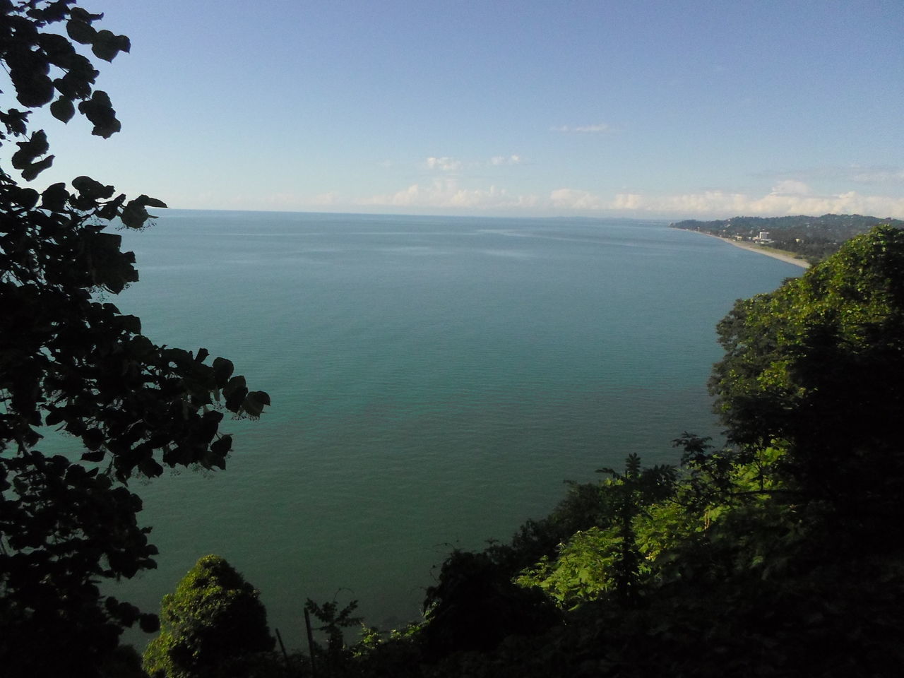 SCENIC VIEW OF CALM SEA AGAINST SKY