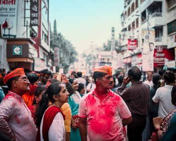 People standing on street in city