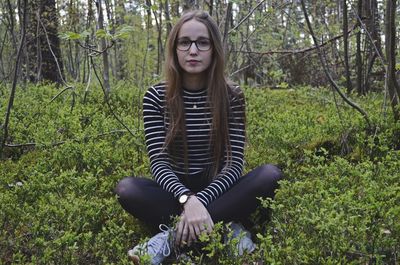 Portrait of woman in forest