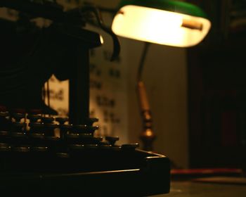 Close-up of illuminated electric lamp