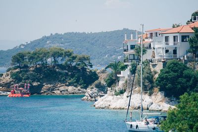 Boats in sea against sky