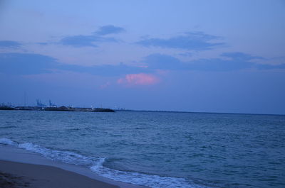 Scenic view of sea against sky at sunset