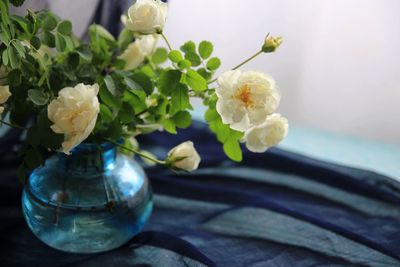 Close-up of white flower vase on table