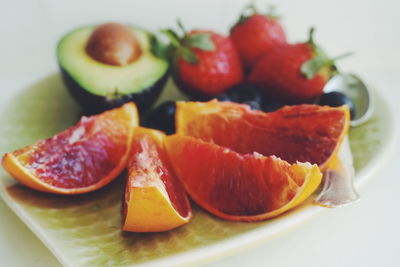 Close-up of fresh fruits on plate