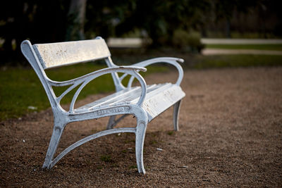 Empty bench in park