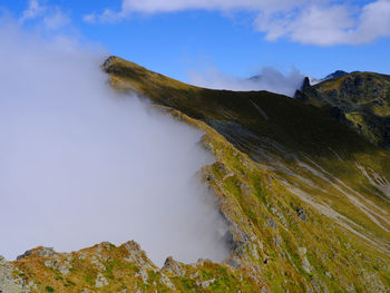 Panoramic view of rocks in mountains against sky