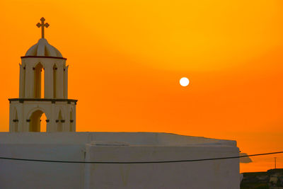 High section of building at sunset