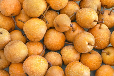 Full frame shot of oranges in market